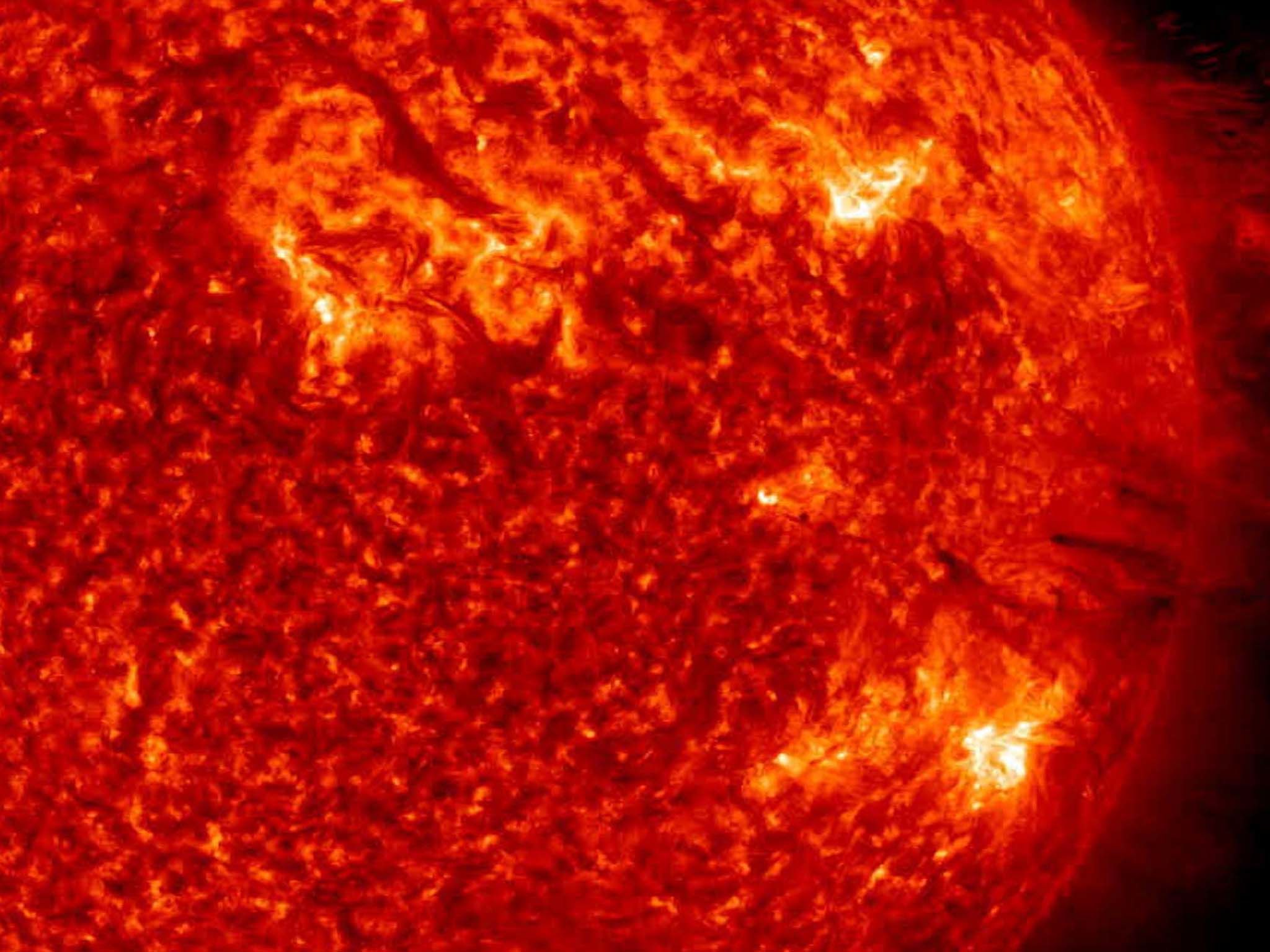 Whole image of the sun, showing ejections, tinted red. [Photo of the day - May 2020]