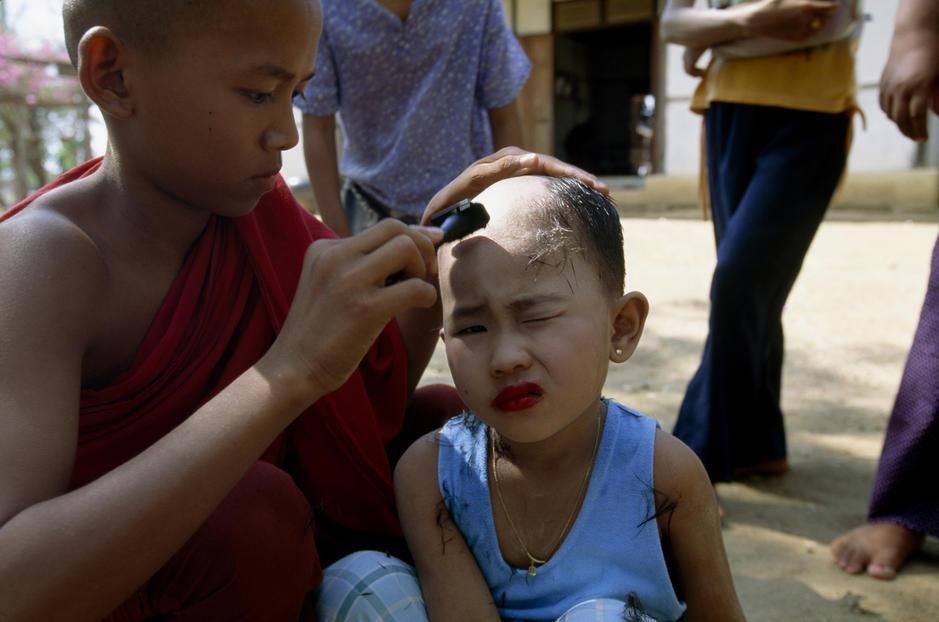 A girl has her head shaved before entering the local monastery in Began. Myanmar. [Photo of the day - September 2011]