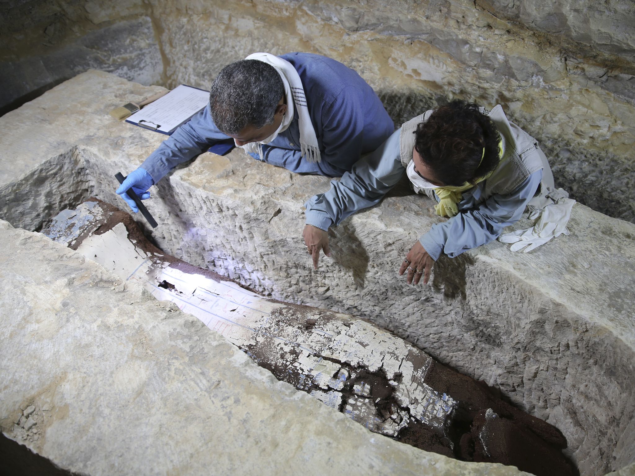 Dr. Ramadan Hussein and Dr. Matthias Lang survey the newly discovered hidden burial chamber at... [Photo of the day - June 2020]
