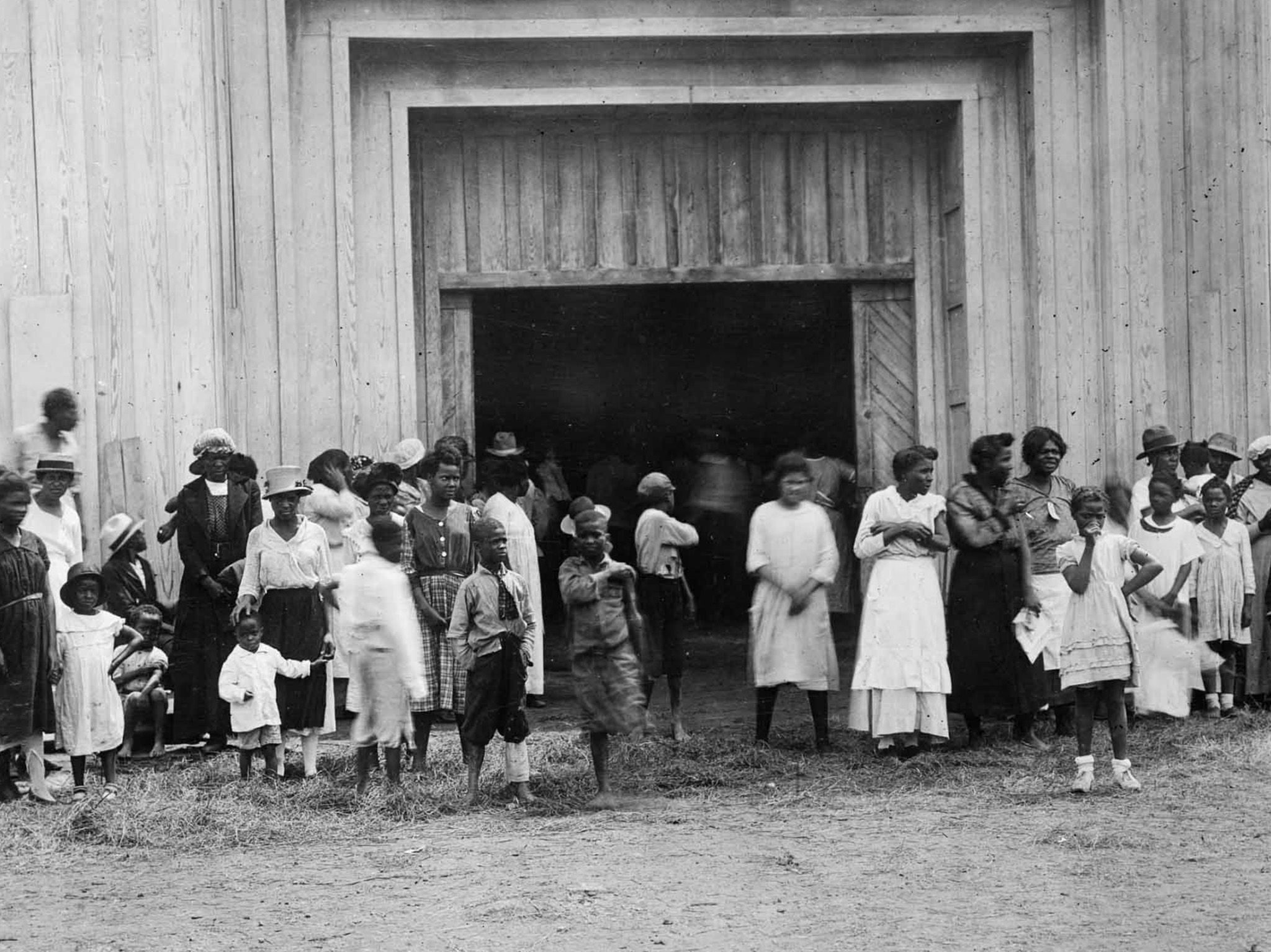 People gathered at the entrance to the refugee camp at the fairgrounds, after the Tulsa Race... [Photo of the day - July 2021]