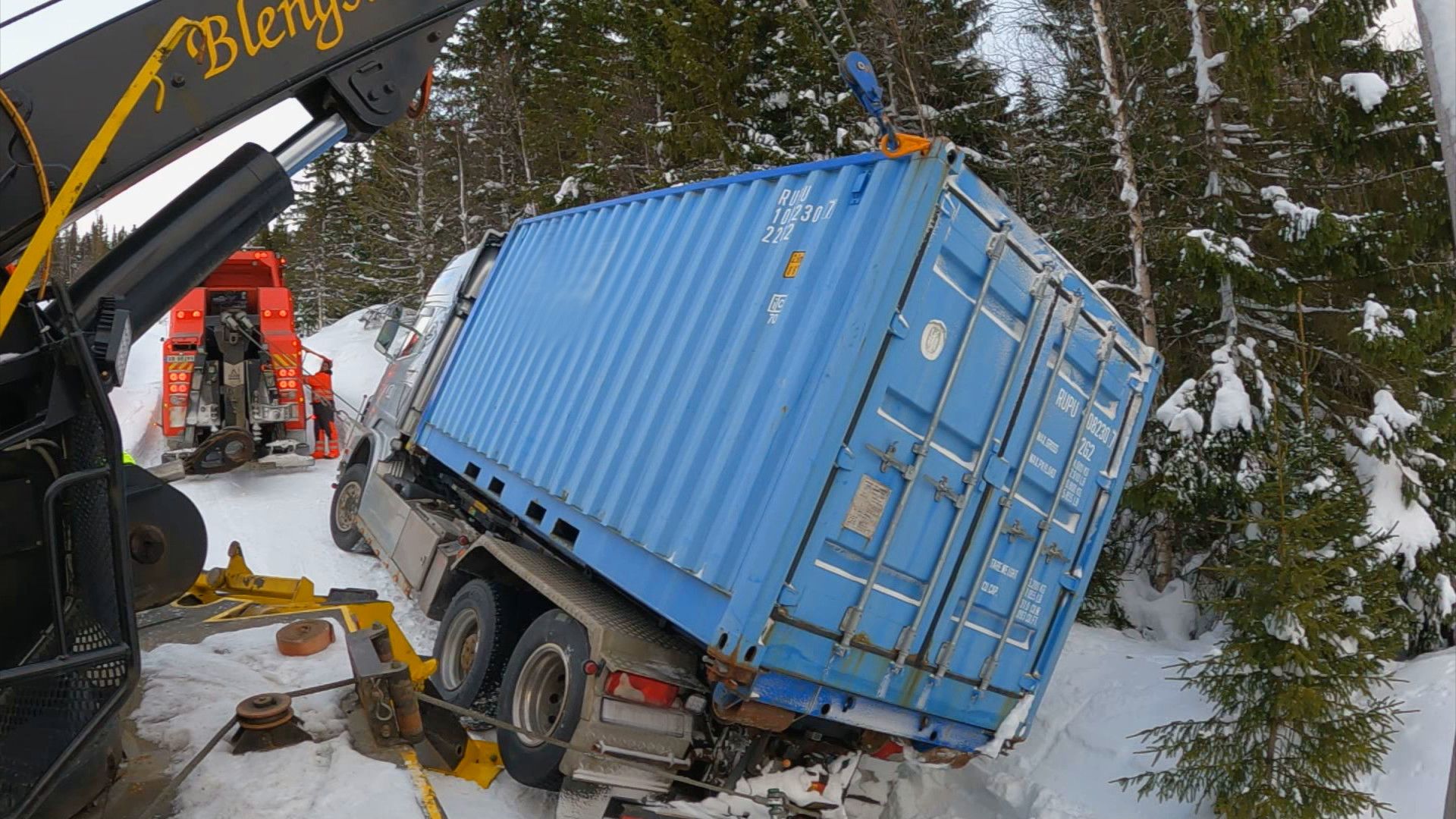 Ole Henrik and Stig try to get a stuck trailer back on the road. This is from Ice Road Rescue [Photo of the day - October 2021]