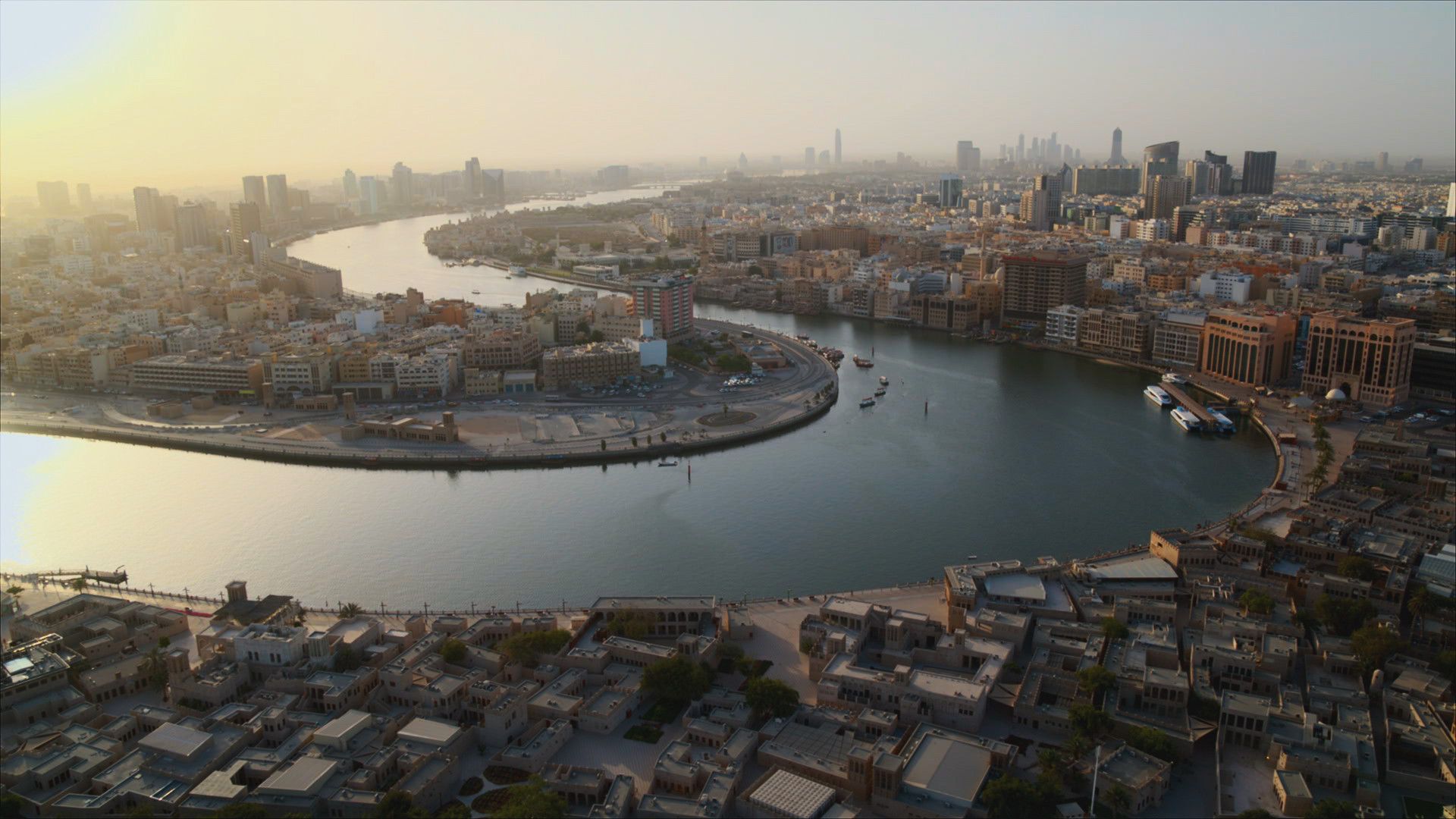 Dubai Creek, the winding saltwater inlet, at sunrise. This is from Emirates from Above. [Photo of the day - December 2021]