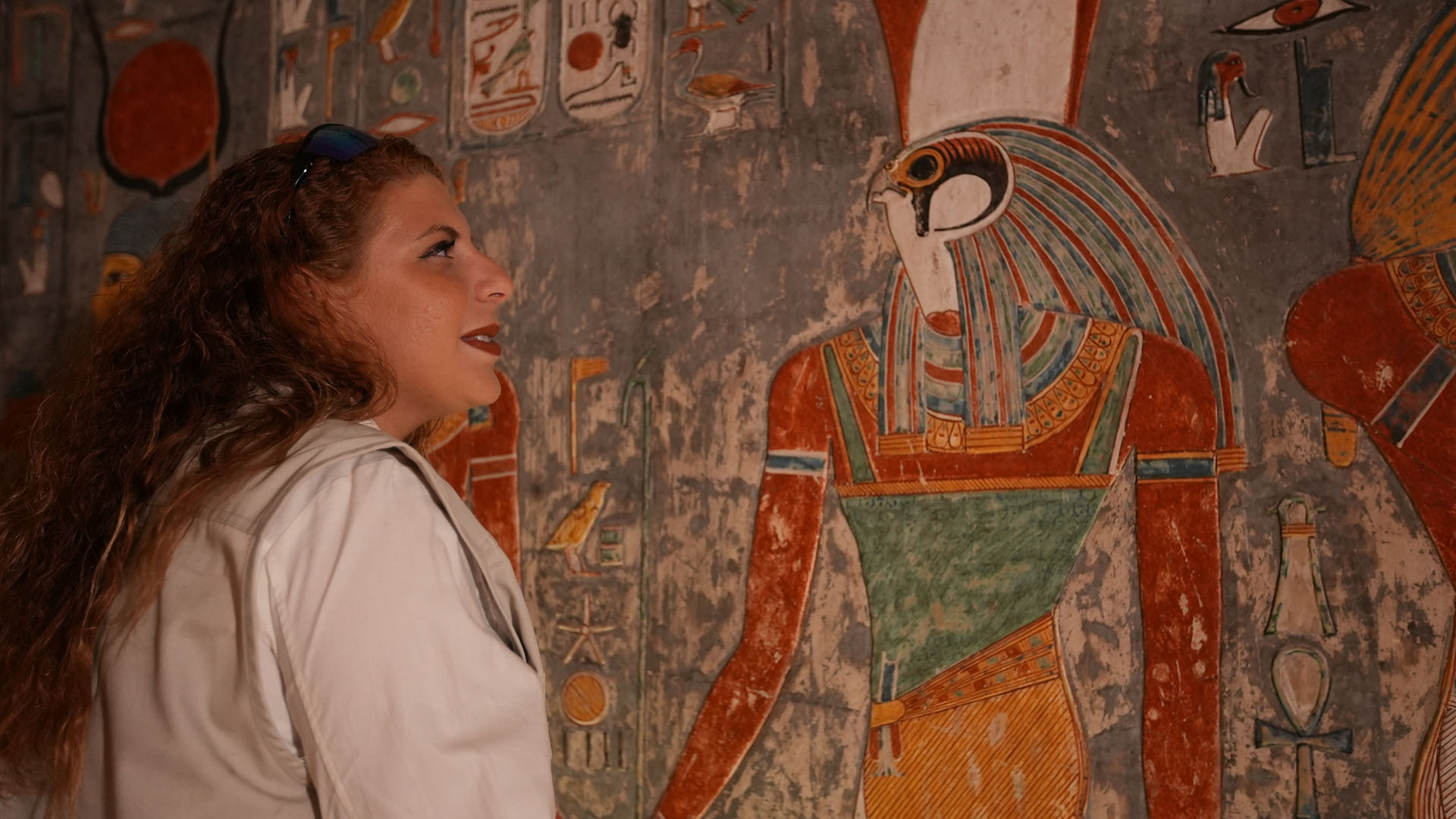 Aliaa Ismail looks at a painting in a tomb at Valley of the Kings. This is from LOST TRASURES OF... [Photo of the day - December 2022]