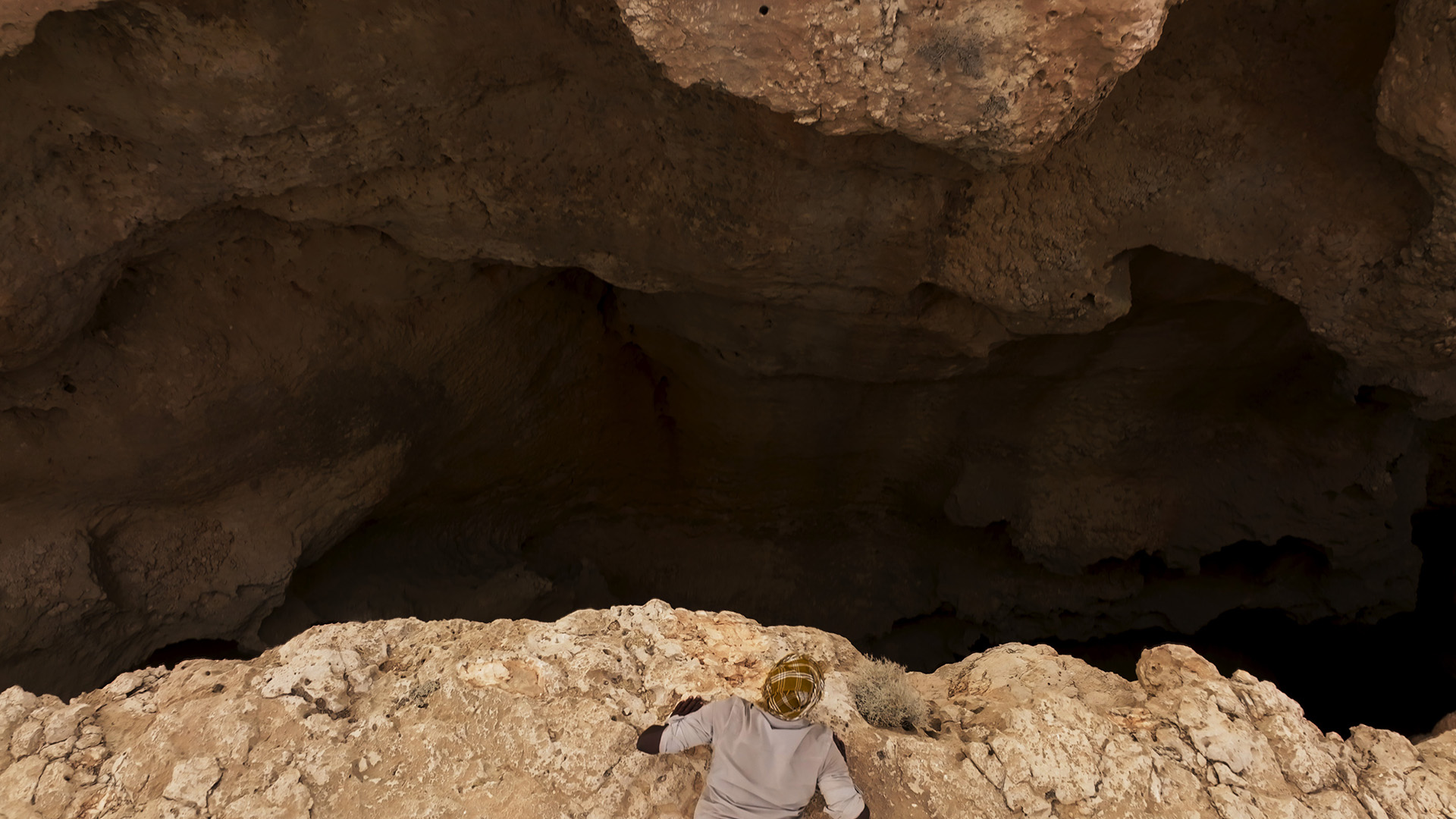 Dwayne Fields looks over the sinkhole.  This is from 7 Toughest Days. [Photo of the day - March 2023]