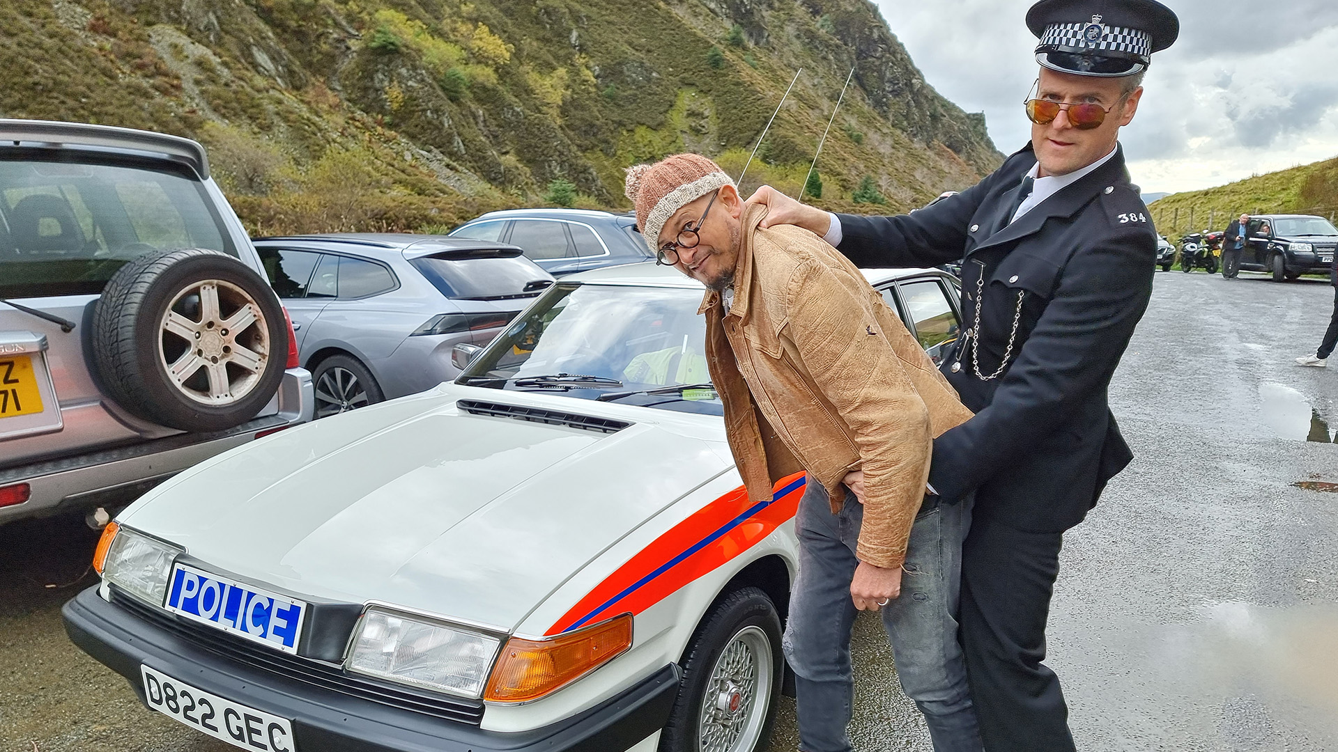 Tim Shaw "arresting" Fuzz Townshend.  This is from Car S.O.S. Season 11. [Photo of the day - May 2023]