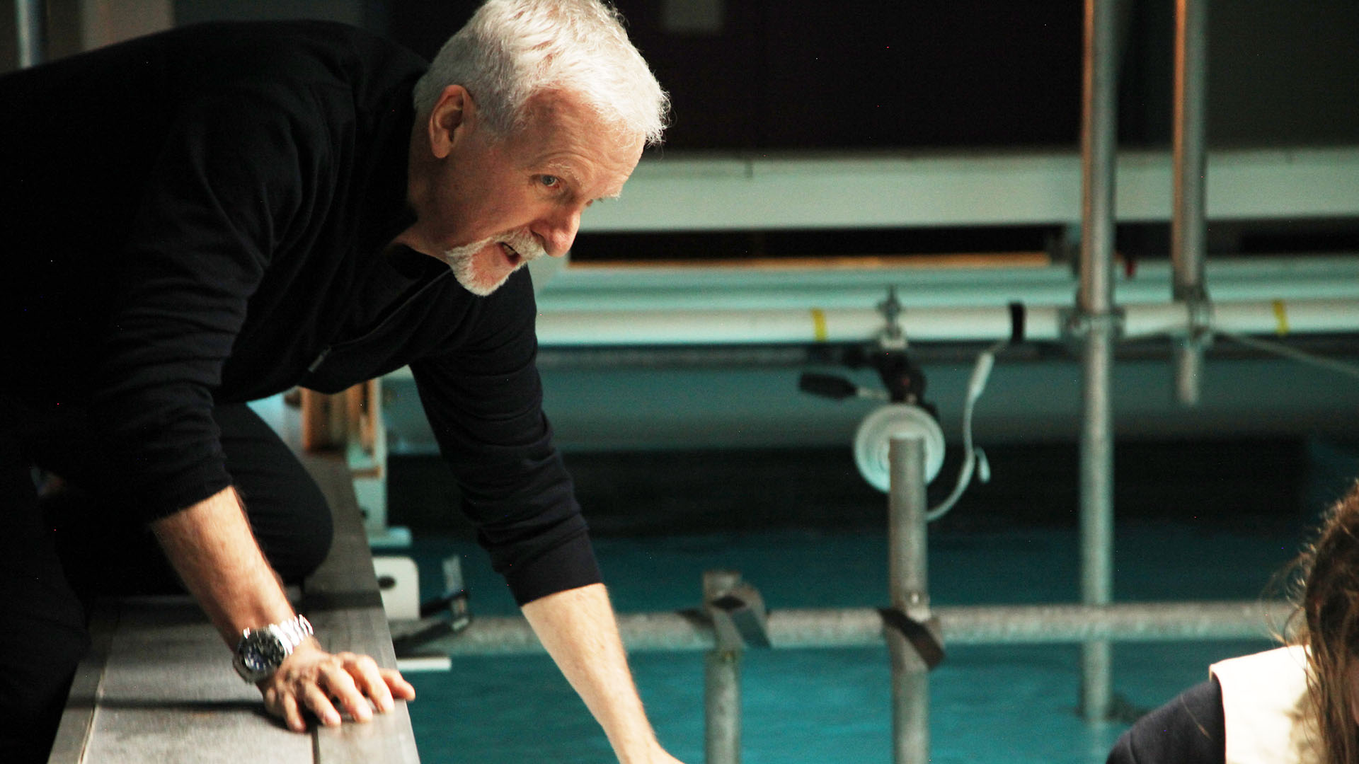James Cameron next to the flume pool laboratory at The University of Otago, School of Physical... [Photo of the day - July 2023]