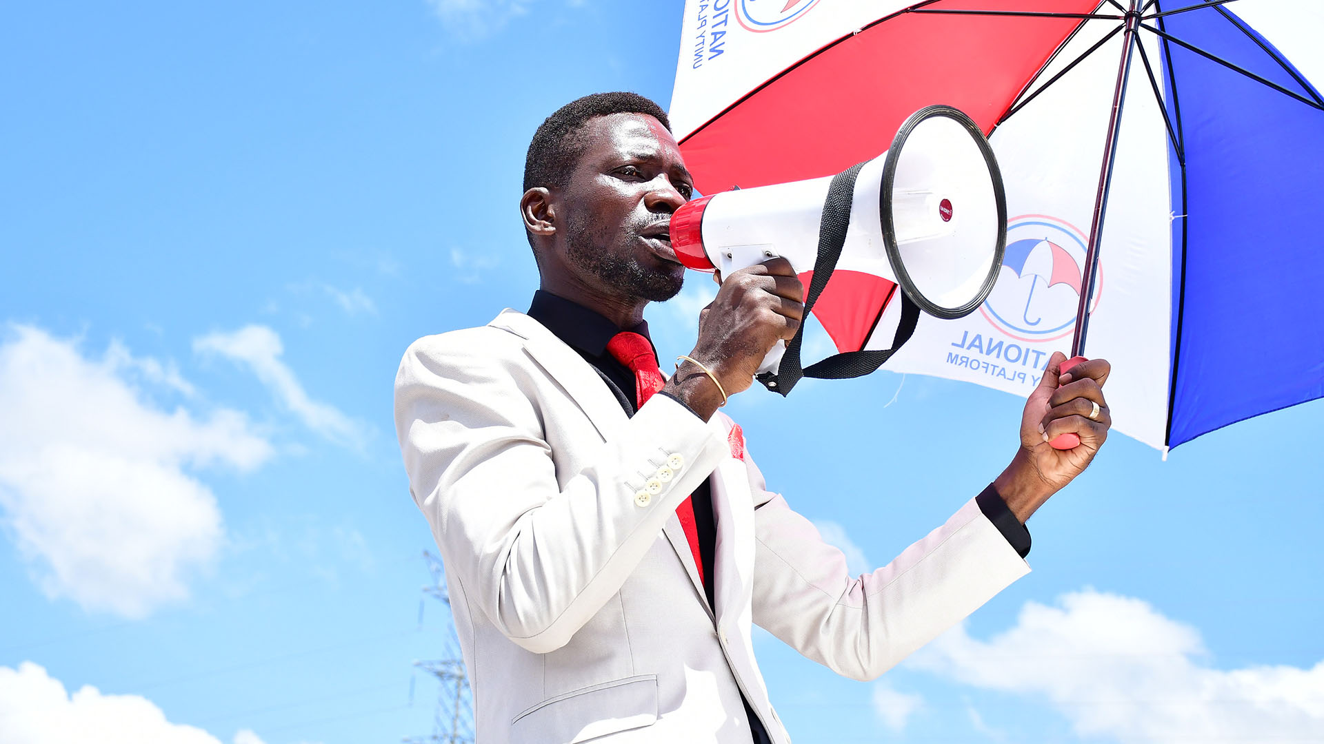 Ugandan politician Robert Kyagulanyi Ssentamu, also known as Bobi Wine, campaigns with a... [Photo of the day - October 2023]