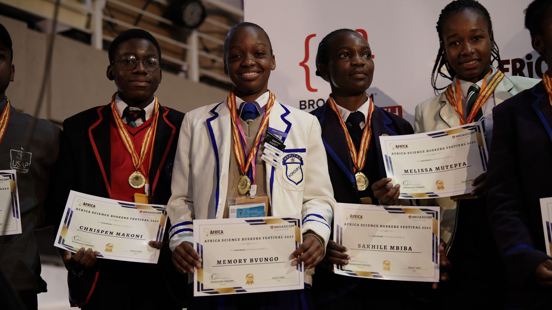The winners of the Zimbabwe Science Fair hold their certificates as they pose together for a... [Photo of the day - January 2024]