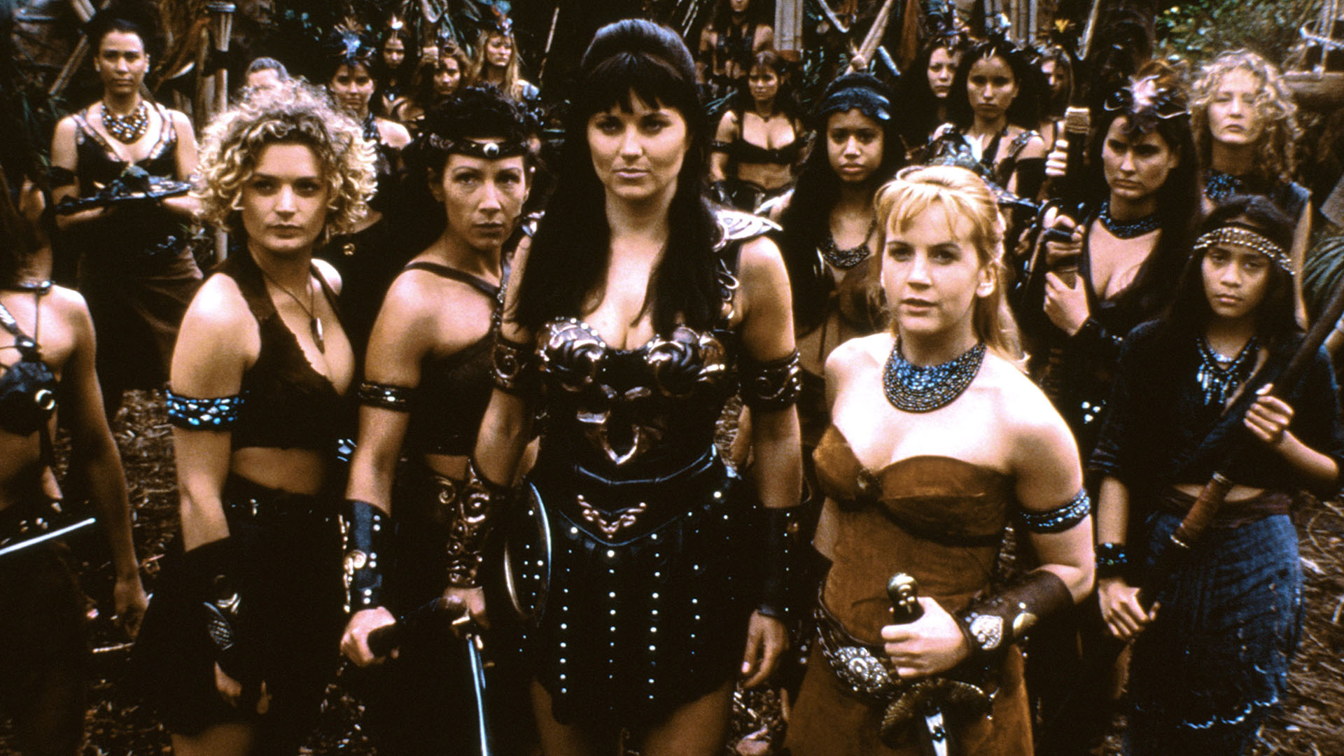 (from left) Danielle Cormack, Alison Bruce, Lucy Lawless, Renee O'Connor on set of XENA: WARRIOR... [Photo of the day - January 2024]