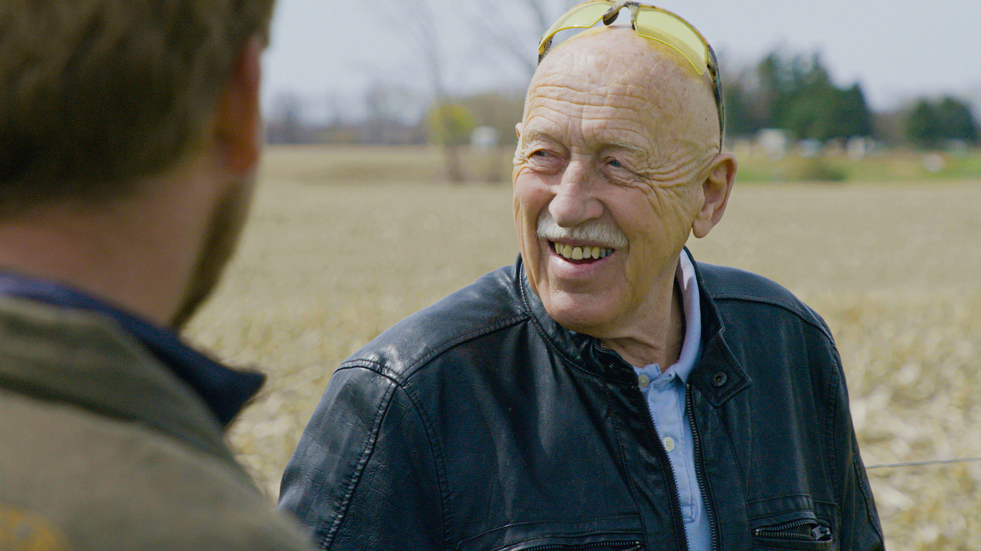 Dr. Jan Pol smiles in the hayfield at the Pol Family Farm as he talks with Charles Pol and Ben... [Photo of the day - January 2024]