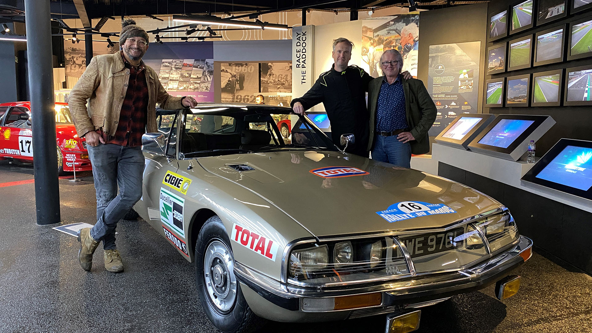 Fuzz Townshend, Tim Shaw and Stuart Scotland stand by the completed car in a car museum. This is... [Photo of the day - April 2024]