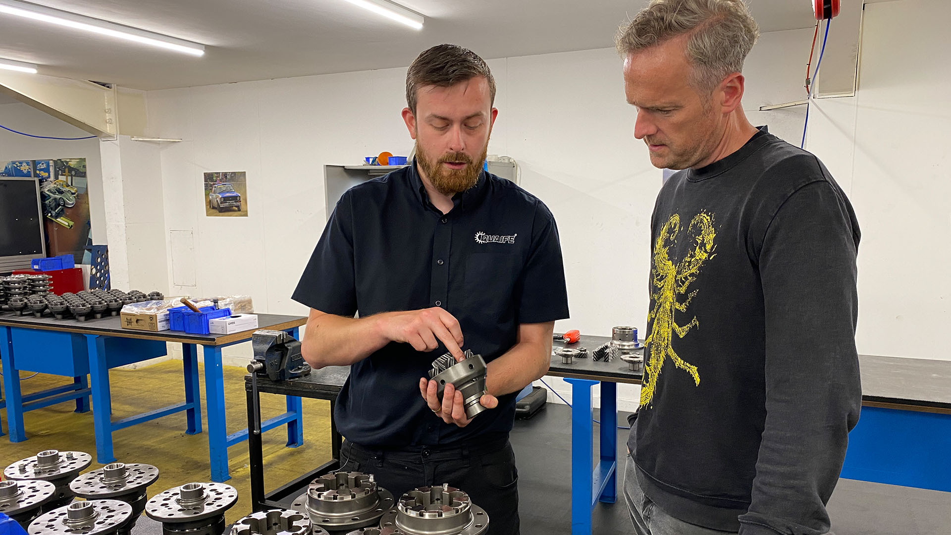 At Quaife Engineering, Dave King and Tim Shaw inspect various car parts for the Ford Pop. This... [Photo of the day - April 2024]