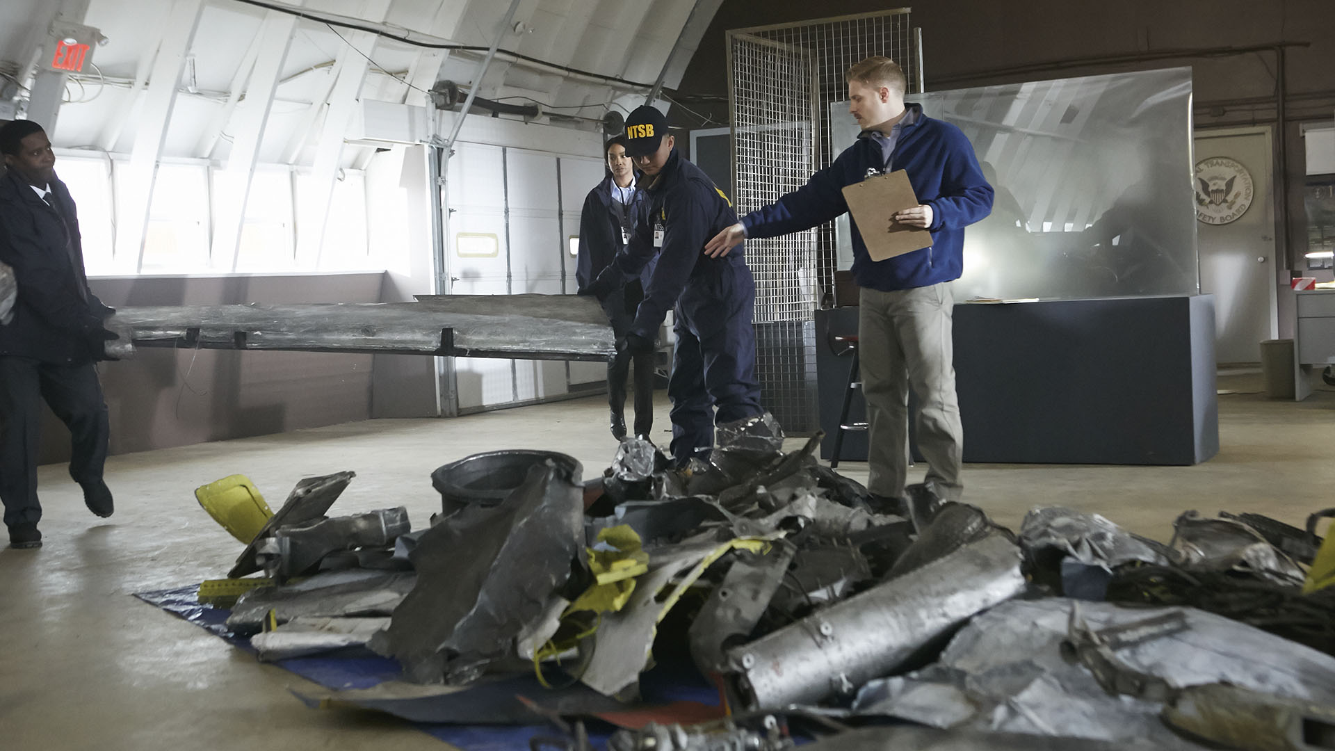 REENACTMENT - NTSB investigator Tom Haueter (played by Christian Lloyd) discovers paint... [Photo of the day - July 2024]