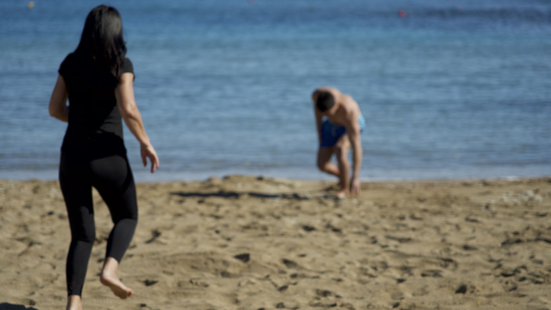 Barbara Pollina running up to Roman and Lola Pollina who is injured coming out of the water.... [Photo of the day - July 2024]