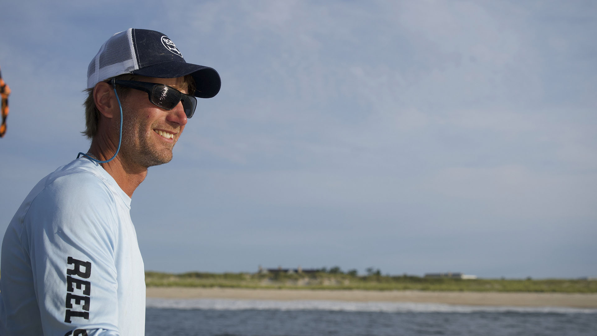 Capt. Greg Metzger fishes for menhaden early in the morning, the baitfish used to catch baby... [Photo of the day - July 2024]