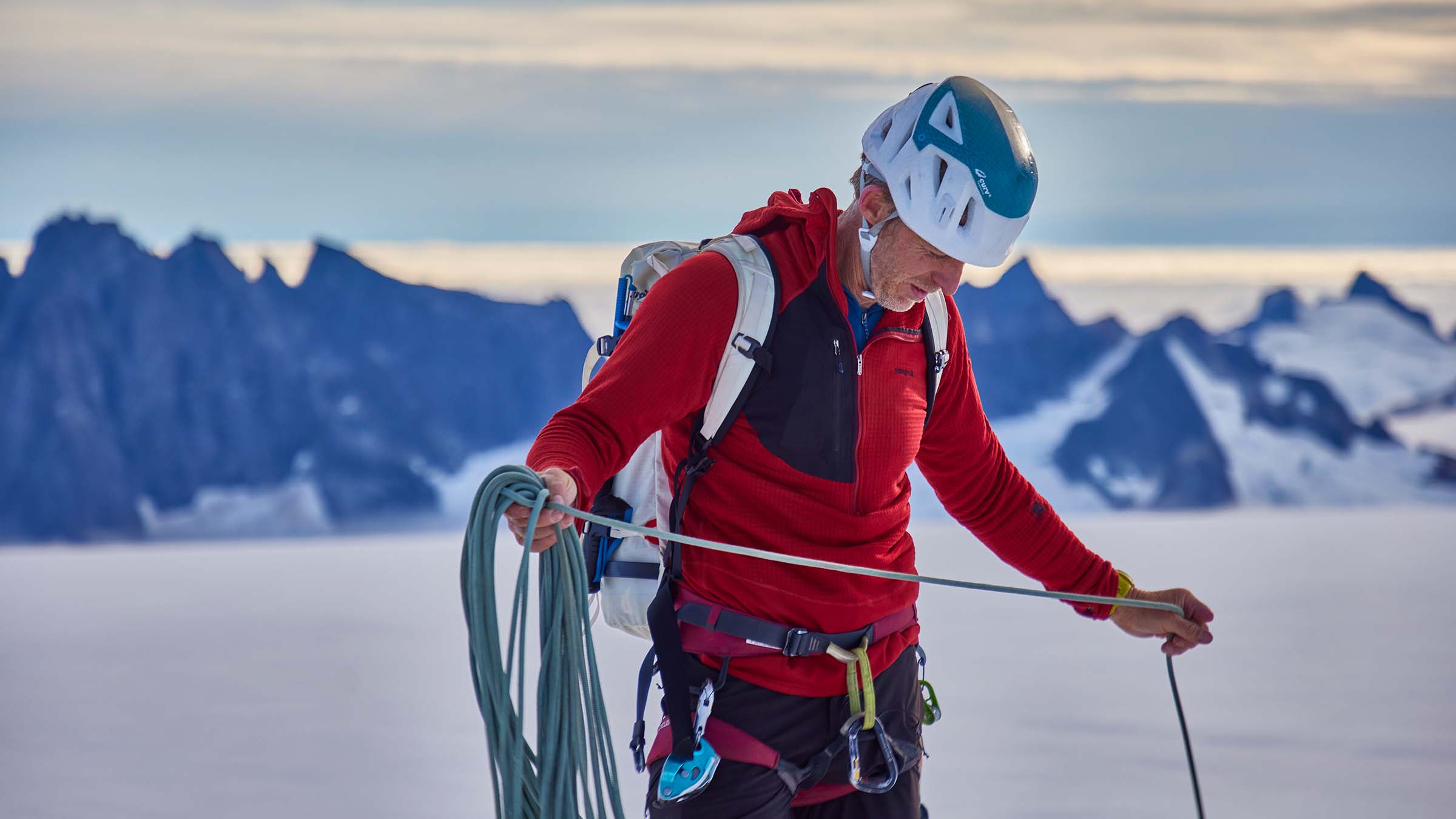 Tommy Caldwell preparing his climbing rope at the glacier camp at the base of the Devil's Thumb.... [Photo of the day - December 2024]