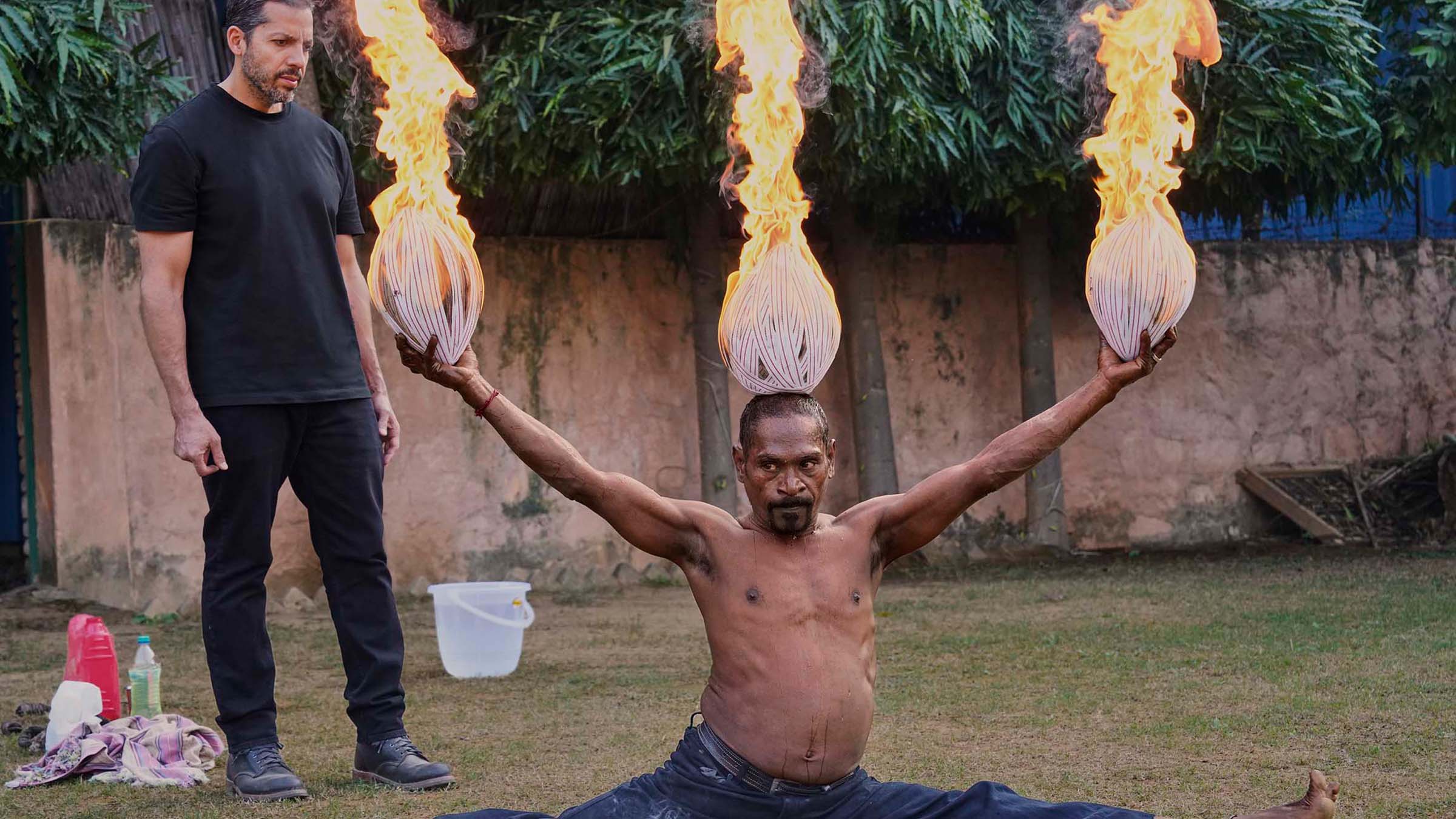 Fire Ramesh performs his routine for David Blaine. [Photo of the day - مارس 2025]