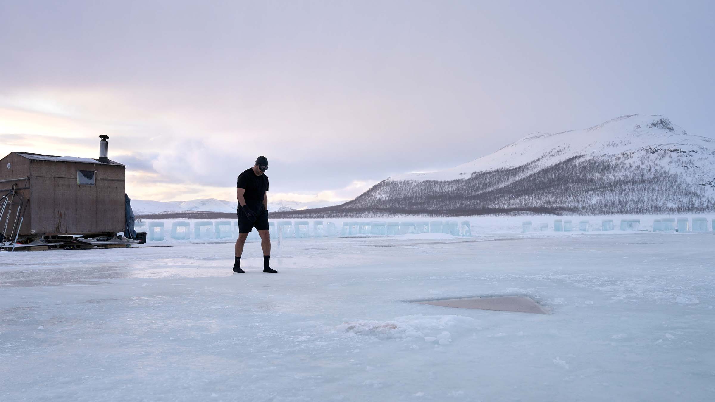 David Blaine walks from the sauna to the ice track. [Photo of the day - March 2025]