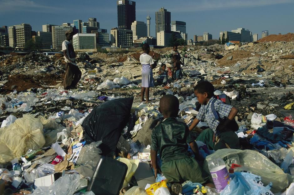 Children scavenging in a dump on the outskirts of Johannesburg. South Africa. [Photo of the day - October 2011]