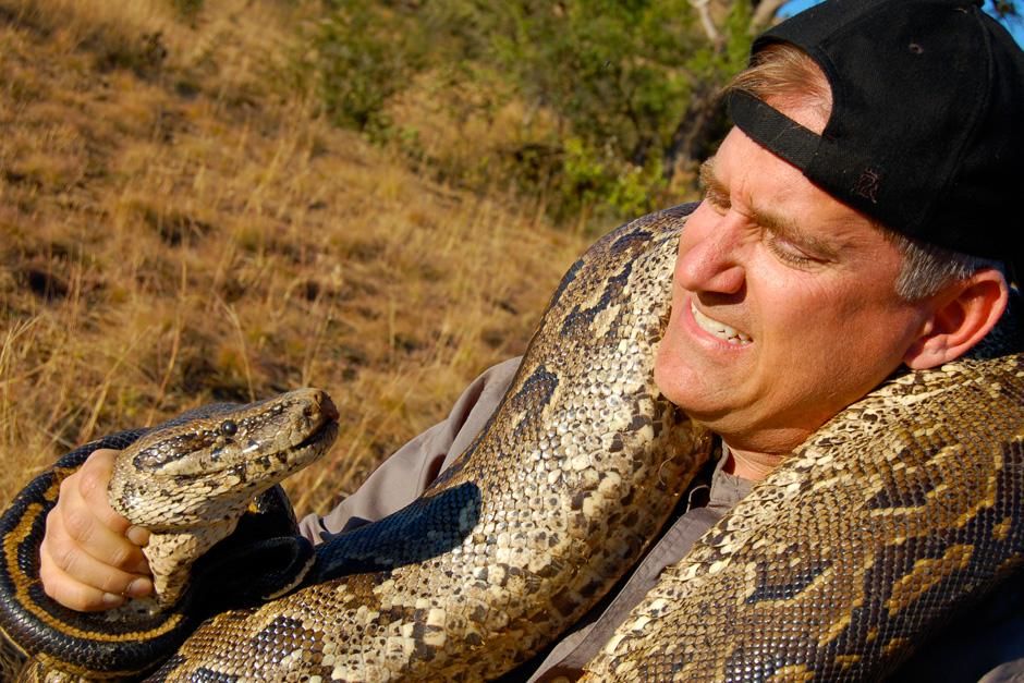 Brady Barr is fearless with a python around his neck. This image is from Dangerous Encounters. [Photo of the day - February 2013]