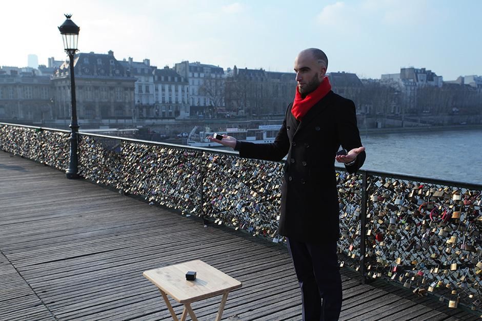 France: Drummond Money-Coutts on Pont Des Arts with ring boxes. This image is from Card Shark. [Photo of the day - September 2013]