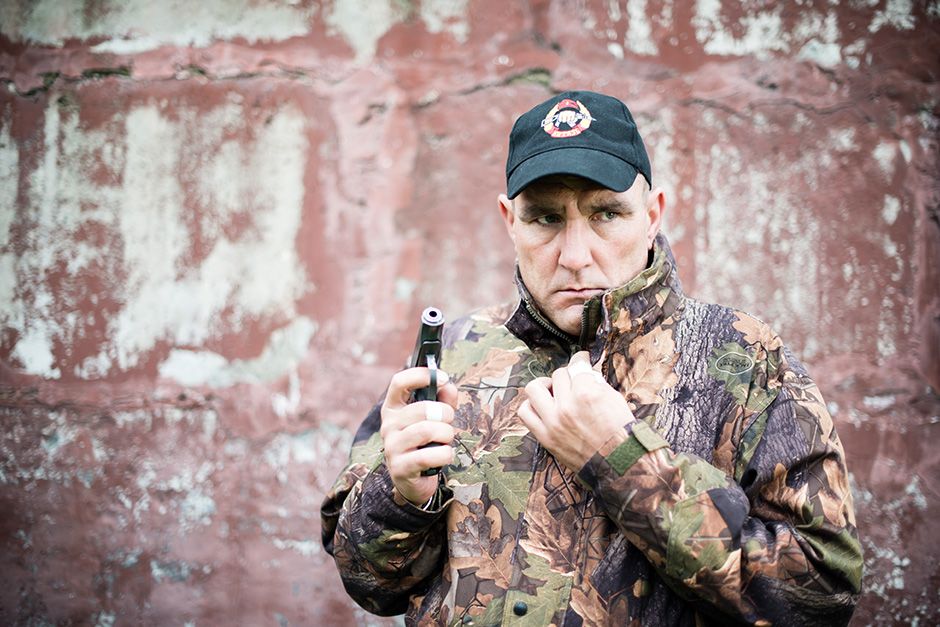 Russia: Vinnie Jones stands armed with a hand gun. This image is from Vinnie Jones: Russia's... [Photo of the day - October 2013]