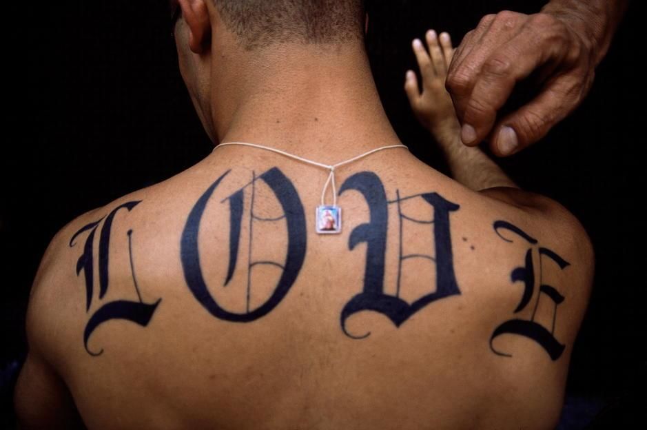 The word "LOVE" tattoed on a man's back in New York City. Happy Valentine's Day. [Photo of the day - February 2011]