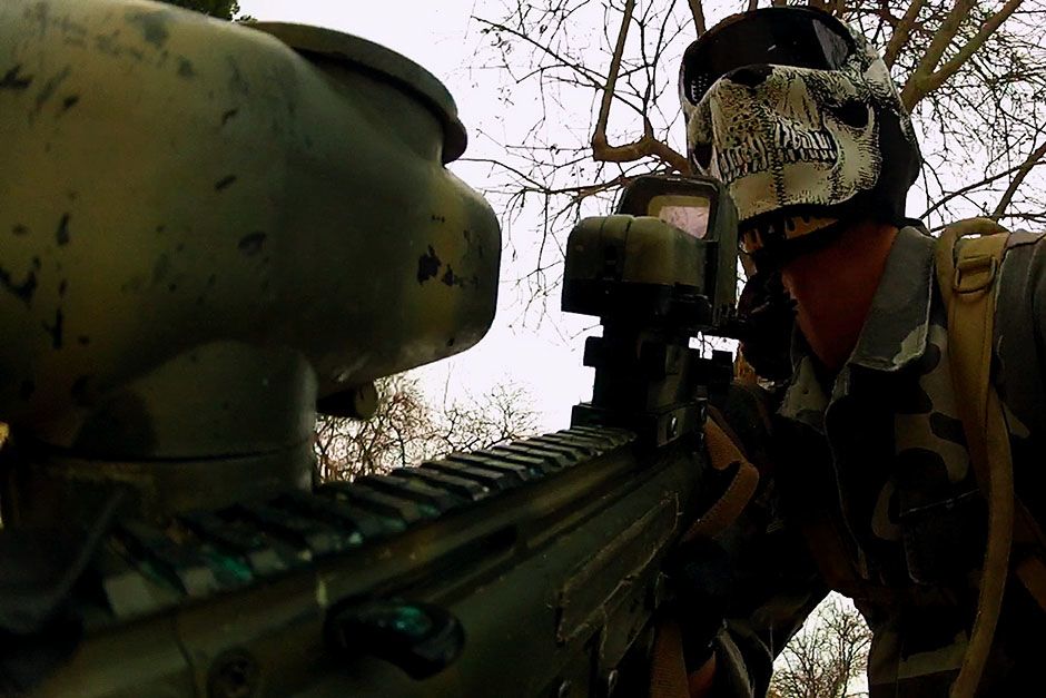 Los Angeles, California, USA: A paintball participant rounds a corner hunting for opponents. He... [Photo of the day - February 2014]