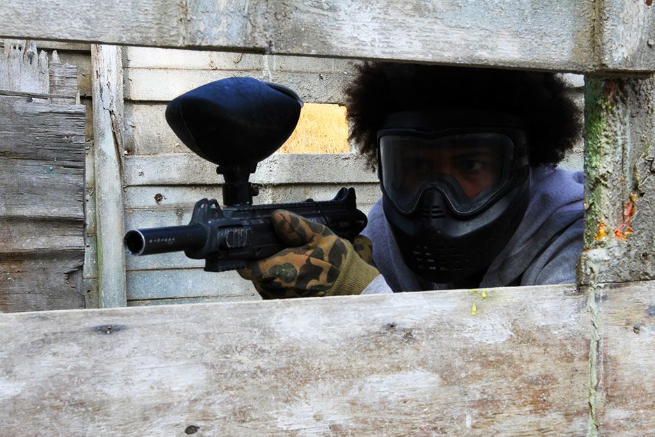 Los Angeles, California, USA: A paintball participant takes cover and hides as he tries to... [Photo of the day - February 2014]