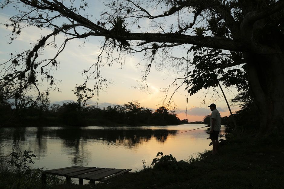 San Juan River, Nicaragua, Central America: Zeb Hogan fishes from the river bank as night falls... [Photo of the day - August 2014]