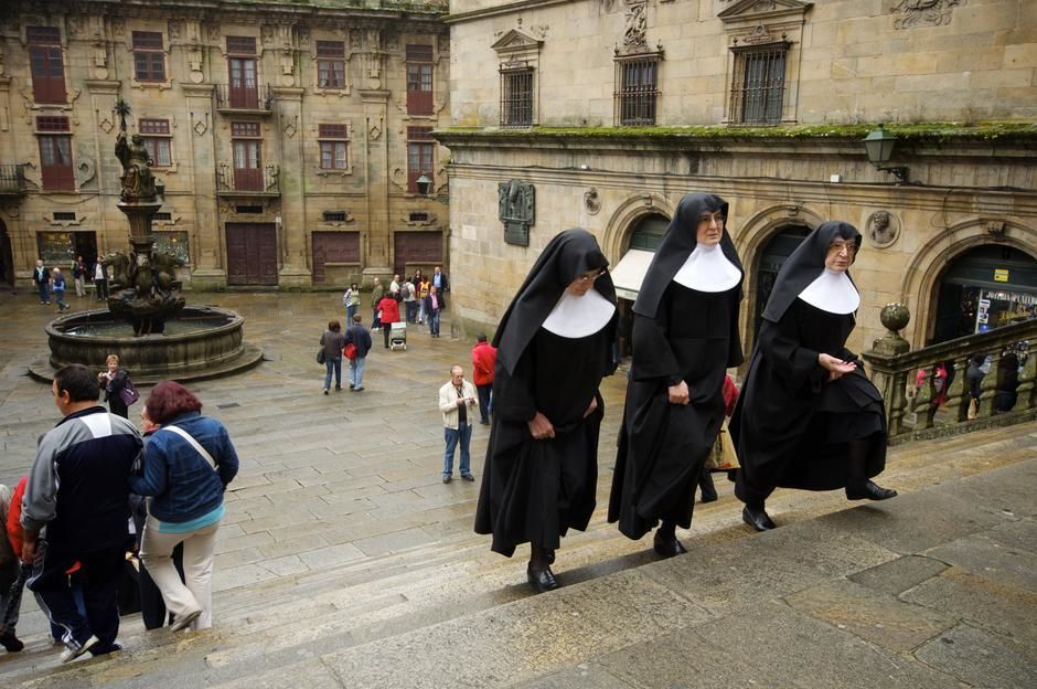 Three nuns climb a stone stairway in a city square in Santiago de Compostela, Galicia. [Photo of the day - April 2011]