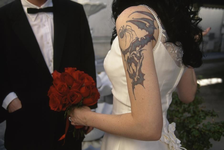A tattoed bride and her groom, Little White Chapel, Las Vegas. [Photo of the day - April 2011]