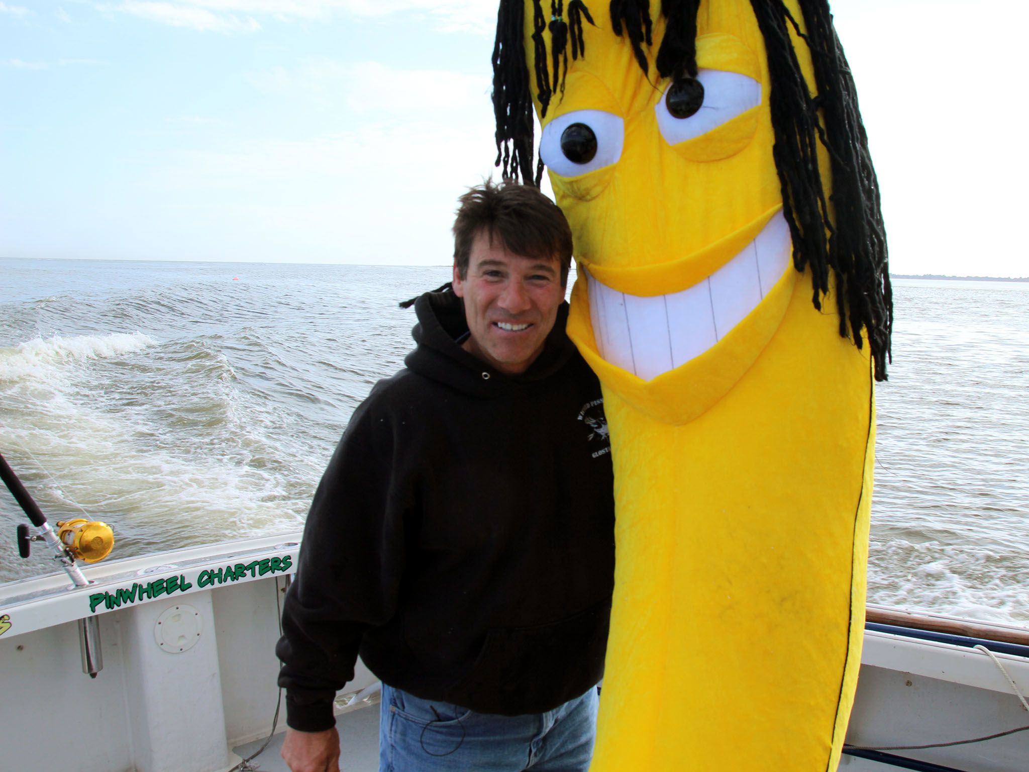 Outer Banks, N.C.: Co-Captain Paul Hebert willingly takes a photo with the prank Rasta Banana... [Photo of the day - September 2015]