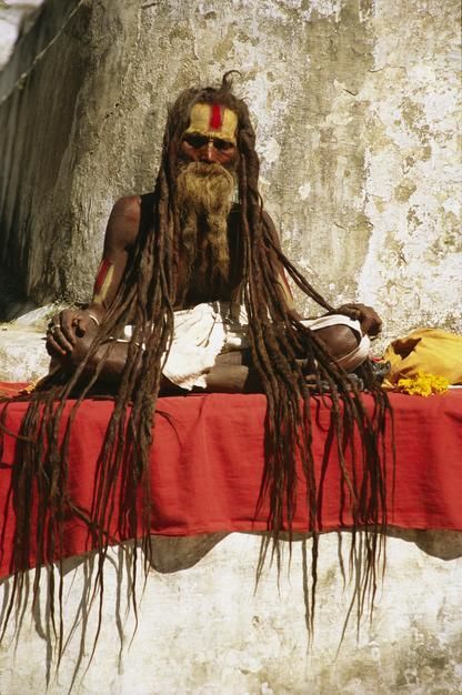 A Hindu holy man with streaming dreadlocks at prayer in Bodhnath. [Photo of the day - June 2011]