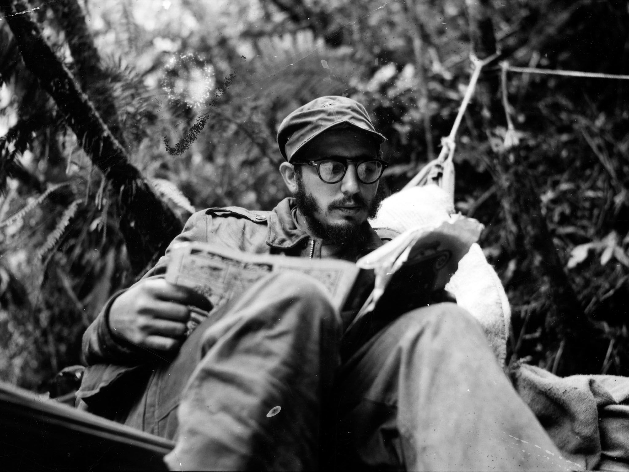 Sierra Maestra Mountains, Eastern Cuba: Fidel Castro catches up on the news at an outpost in the... [Photo of the day - June 2016]
