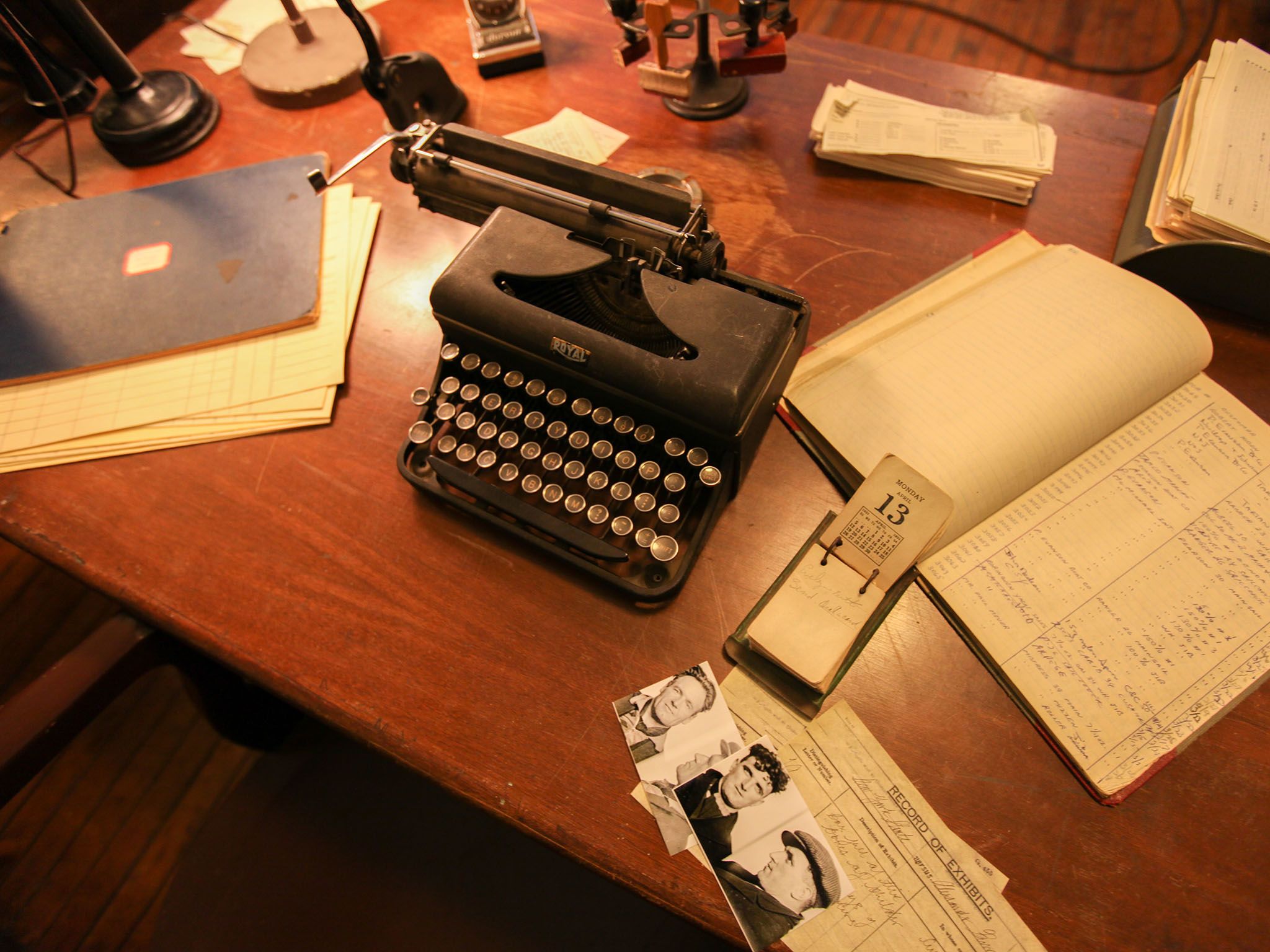 Reenactment: A typewriter and various documents on a desk inside police headquarters. This image... [Photo of the day - September 2016]