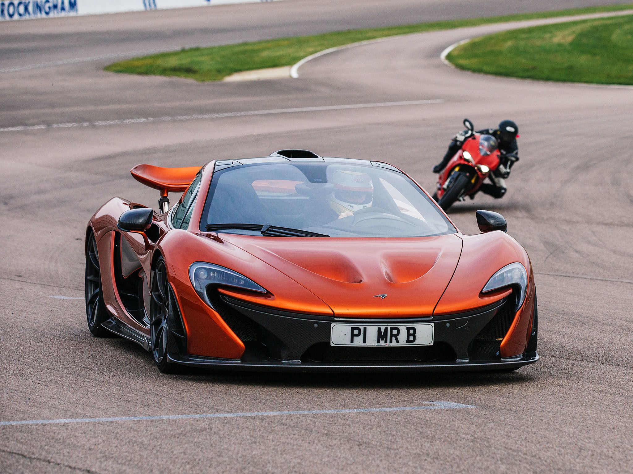 Leicester, UK: P1 and  Bike on the track at the Rockingham Motor Speedway. This image is from... [Photo of the day - May 2017]