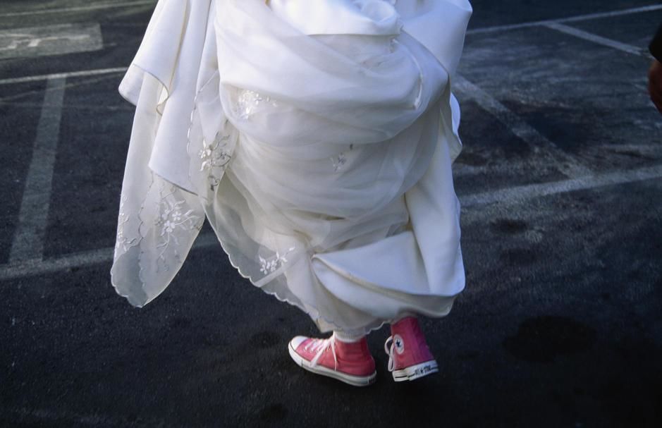 A Las Vegas bride in her gown and pink converse, Nevada. USA. [Photo of the day - August 2011]