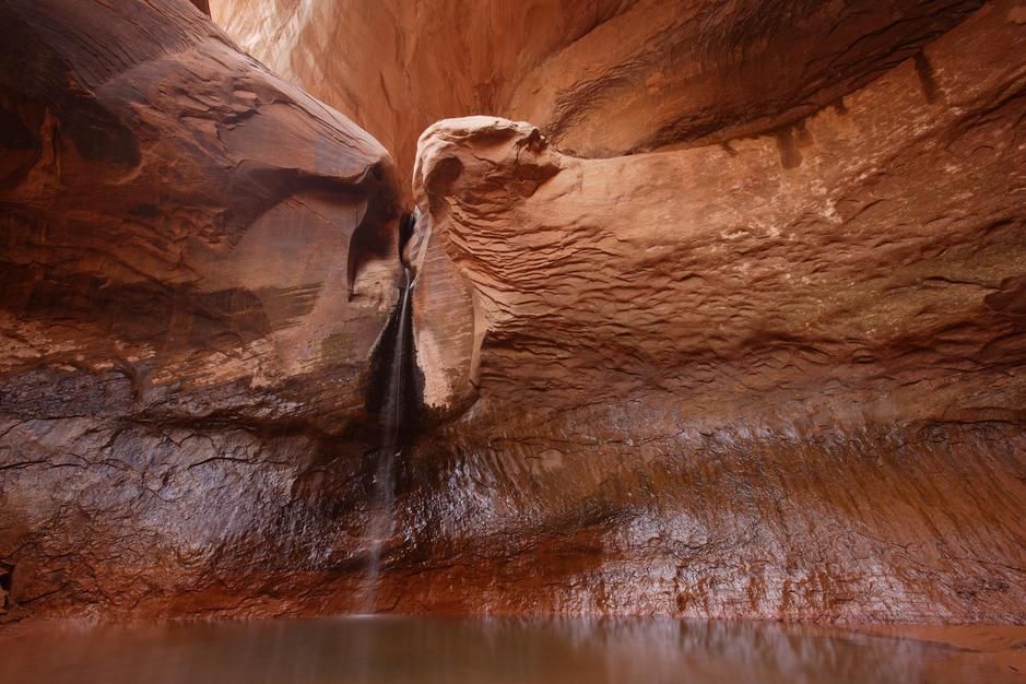 A small waterfall is revealed inside the Cathedral in the Desert during Lake Powell's lowest... [Photo of the day - August 2011]