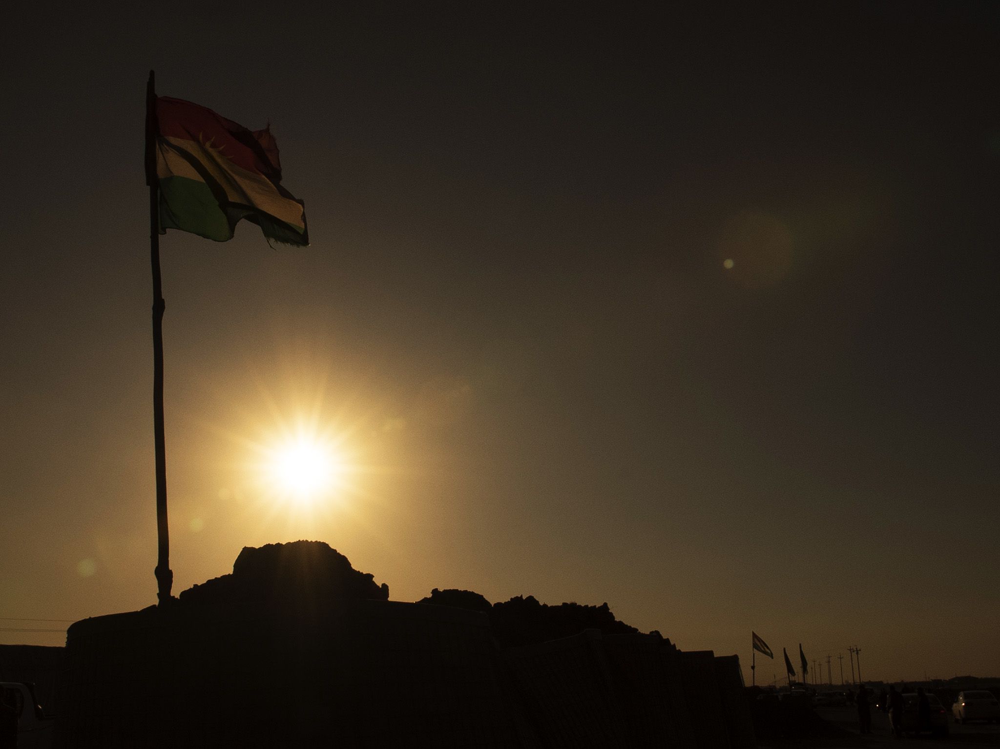 Mosul, Iraq:  A Peshmerga flag in the sun.  This image is from Chain of Command. [Photo of the day - February 2018]